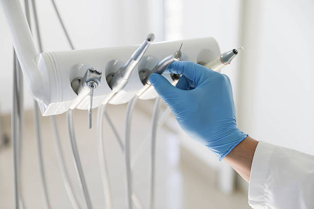 Professional Tooth Extraction technician working in Carteret County County, NC